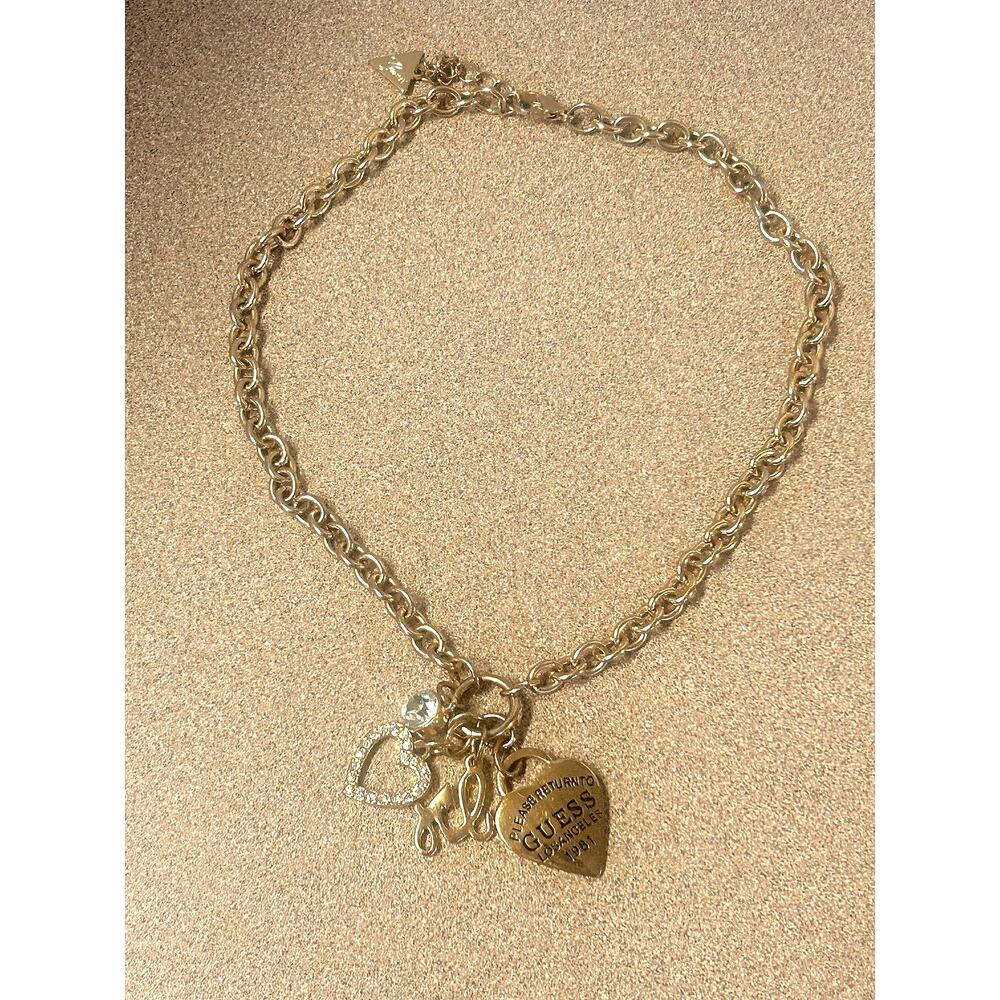 GUESS “PLEASE RETURN TO GUESS LOS ANGELES 1981" gold-tone toggle chain necklace